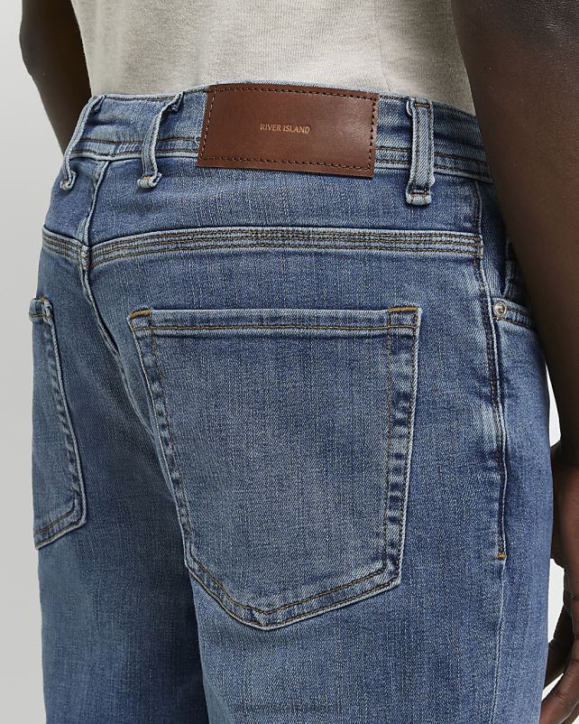 kehakate sinine mehed River Island kitsenevad teksapüksid 44TLL2931